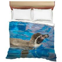 Little Penguin Swimming In Blue Water. Bedding 72678599