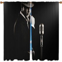 Low Key Portrait Of Jazz Singer In Hat In The Darkness. Window Curtains 60169635