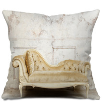 Luxurious Golden Sofa On A Background Of Old White Wall Pillows 136055200