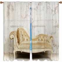 Luxurious Golden Sofa On A Background Of Old White Wall Window Curtains 136055200