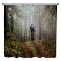 Male Athlete Mountainbiker Rides A Bicycle Along A Forest Trail In Forest Mist Mysterious View Bath Decor 117998340