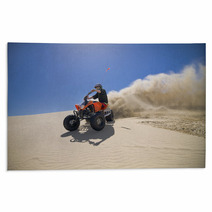 Male ATV Rider Roosting Sand In The Oregon Sand Dunes Rugs 22546636