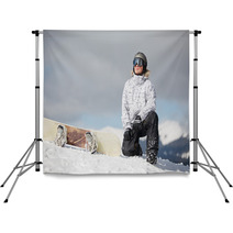 Male Snowboarder Against Sun And Blue Sky Backdrops 46541965