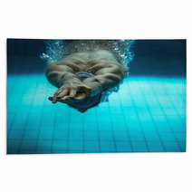 Male Swimmer At The Swimming Pool.Underwater Photo. Rugs 77741766