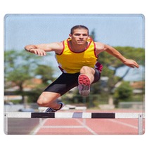 Male Track And Field Athlete During Obstacle Race Rugs 43776854