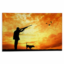 Man And Dog Hunters Silhouette At Sunset Rugs 56750932