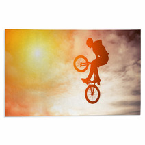 Man Doing An Jump With A BMX Bike In Sunset Sky Rugs 61147297