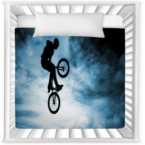 Man Doing An Jump With A Bmx Bike Over Blue Sky Background Nursery Decor 58094528