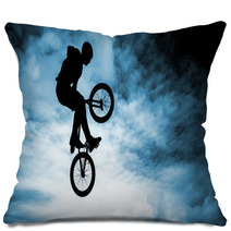 Man Doing An Jump With A Bmx Bike Over Blue Sky Background Pillows 58094528