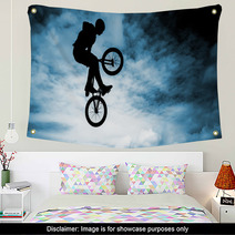 Man Doing An Jump With A Bmx Bike Over Blue Sky Background Wall Art 58094528