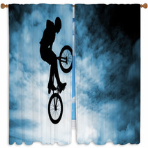 Man Doing An Jump With A Bmx Bike Over Blue Sky Background Window Curtains 58094528