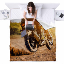 Man Extreme Riding Touring Enduro Motorcycle On Dirt Field Blankets 136884886