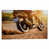 Man Extreme Riding Touring Enduro Motorcycle On Dirt Field Rugs 136884886