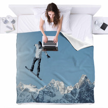 Man Snowboarding With Icy Mountain Background Blankets 66369995