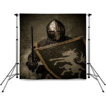 Medieval Knight With Sword And Shield Against Stone Wall Backdrops 48836905