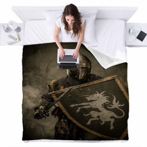 Medieval Knight With Sword And Shield Against Stone Wall Blankets 48836901