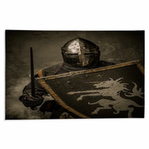 Medieval Knight With Sword And Shield Against Stone Wall Rugs 48836905