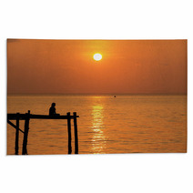 Meditation Man On Wooden Pier Under Sunset Sea Rugs 68727843