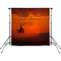Military Helicopter In Flight Against A Dramatic Red Sky Backdrops 50020363