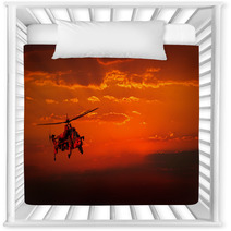 Military Helicopter In Flight Against A Dramatic Red Sky Nursery Decor 50020363
