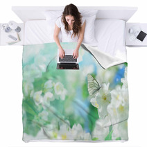 Natural Background With Butterfly On The Branch Of Blooming Jasmine Spring Scene Blankets 193461163