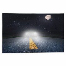 Night Driving On An Asphalt Road Towards The Headlights Rugs 61771690
