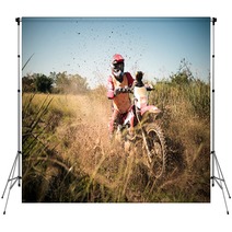 Off Road Dirt Bike Rider Splashing Mud In Hard Enduro Rally Race Backdrops 127991128