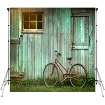Old Bicycle Leaning Against Grungy Barn Backdrops 26545268