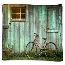 Old Bicycle Leaning Against Grungy Barn Blankets 26545268