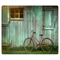 Old Bicycle Leaning Against Grungy Barn Rugs 26545268