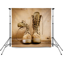 Old Brown Military Boots On A Wooden Table Backdrops 127621049
