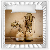 Old Brown Military Boots On A Wooden Table Nursery Decor 127621049