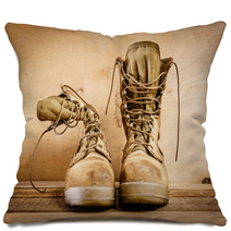 Old Brown Military Boots On A Wooden Table Pillows 127621049