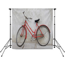 Old Red Bicycle Leaning Against A Wall Backdrops 2345232