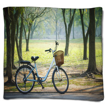 Old Vintage Bicycle In Public Park With Green Nature Concept Blankets 64445801