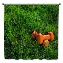 Pair Of Orange Dumbbells On Grass In Warm Morning Light Fitnes Bath Decor 110251860