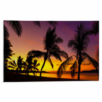 Palms Silhouettes On A Tropical Beach At Sunset Rugs 53244111