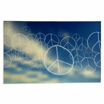 Peace Symbol Over Blue Sky Blurred Background Rugs 67924621
