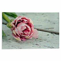 Pink Tulips On A Wooden Surface Rugs 40665591