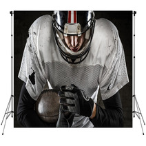 Portrait Of American Football Player Holding A Ball And Looking Backdrops 59517619