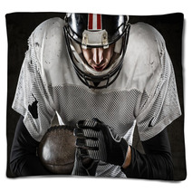 Portrait Of American Football Player Holding A Ball And Looking Blankets 59517619