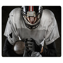 Portrait Of American Football Player Holding A Ball And Looking Rugs 59517619