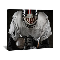 Portrait Of American Football Player Holding A Ball And Looking Wall Art 59517619