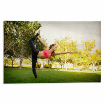 Pretty Woman Doing Yoga Exercises In The Park Rugs 115027038