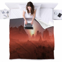 Red Rocky Desert Landscape In The Mist At Sunset. Panoramic Shot Blankets 67429668