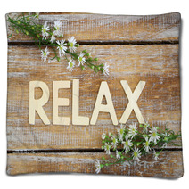 Relax Written On Rustic Wood And Chamomile Flowers
 Blankets 91278913