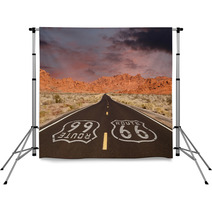 Route 66 Pavement Sign With Red Rock Mountain Sunset Backdrops 66687644