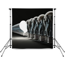 Row Of Light Bulbs On Black Background Backdrops 46830627