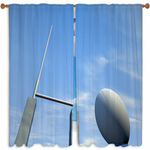 Rugby Ball Closeup Infront Of Posts Window Curtains 64983539