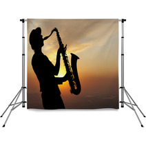 Saxophonist At Sunset Backdrops 57290635